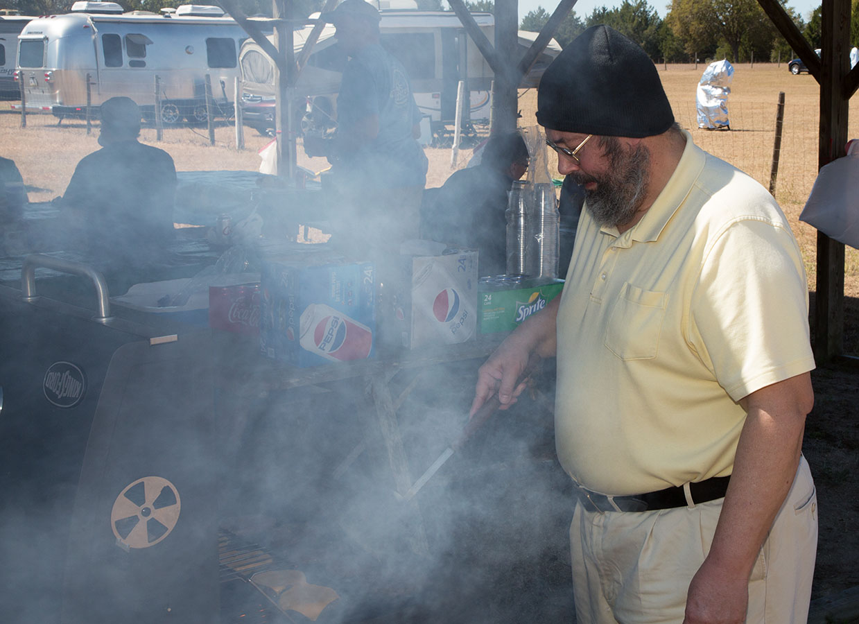Glenn Malek works the grill.
