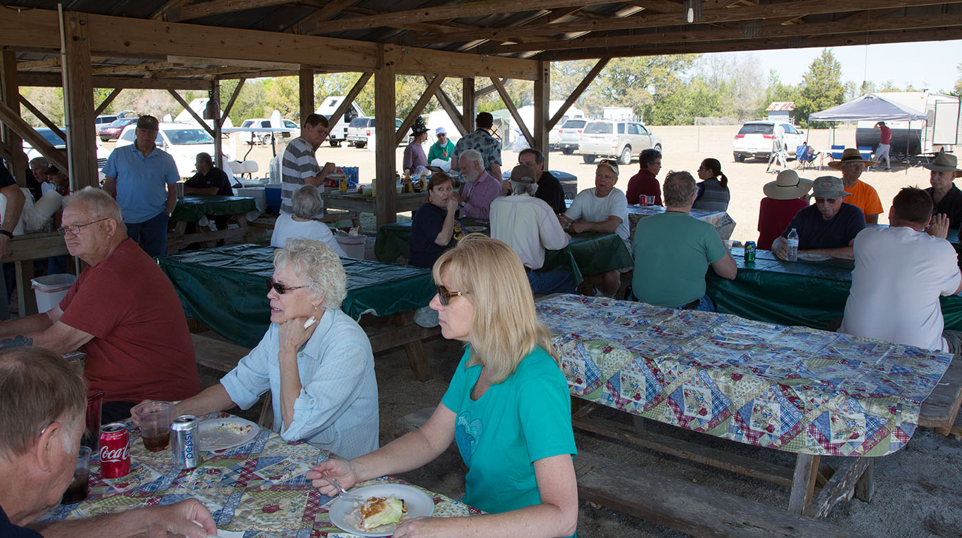 Enjoying food and conversation.