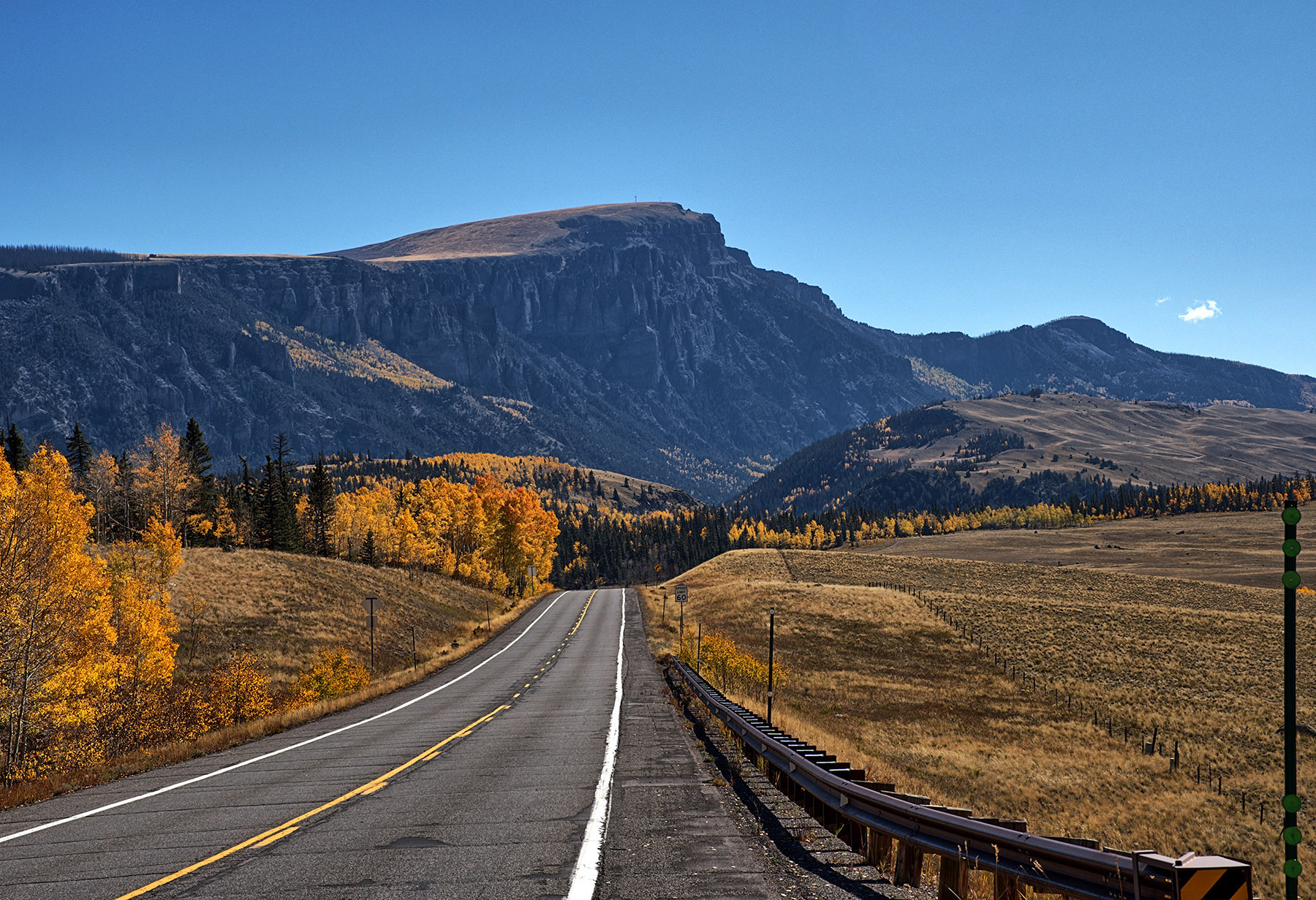 Colorado Hwy 149 headed South towards Creede passes near the towering outer rim of the Creede Caldera composed of basalt from middle Tertiary lava flows.