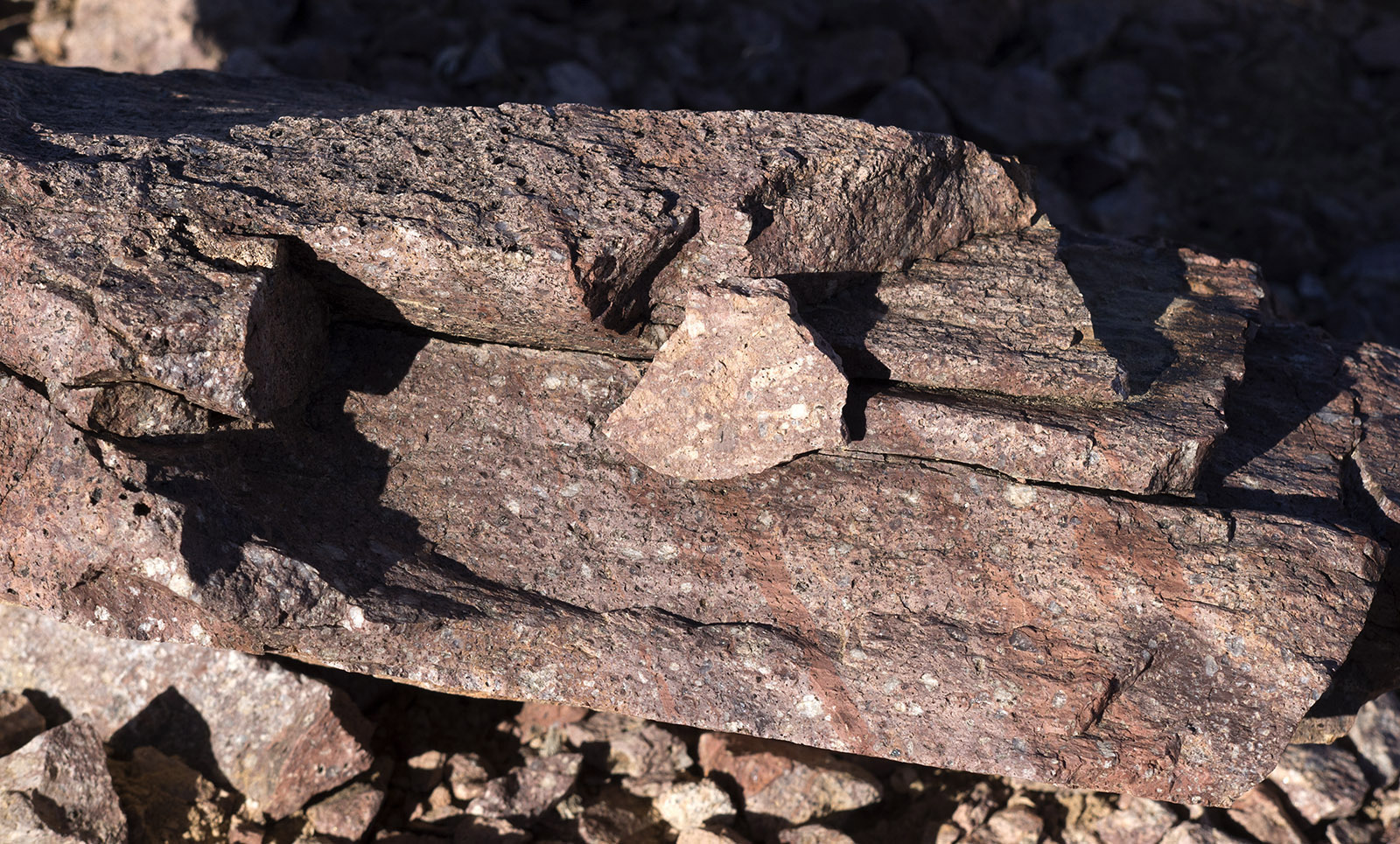 Dante's View area Black Mountains:  The upper surface is covered by rhyolitic porphyritic igneous (volcanic) rock that was deposited 6-7 million years ago (MA), Miocene epoch according to radiometric dating.