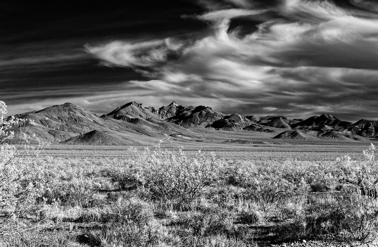 Titus Canyon Road:  Low hills of predominantly volcanic origin.  Infrared image