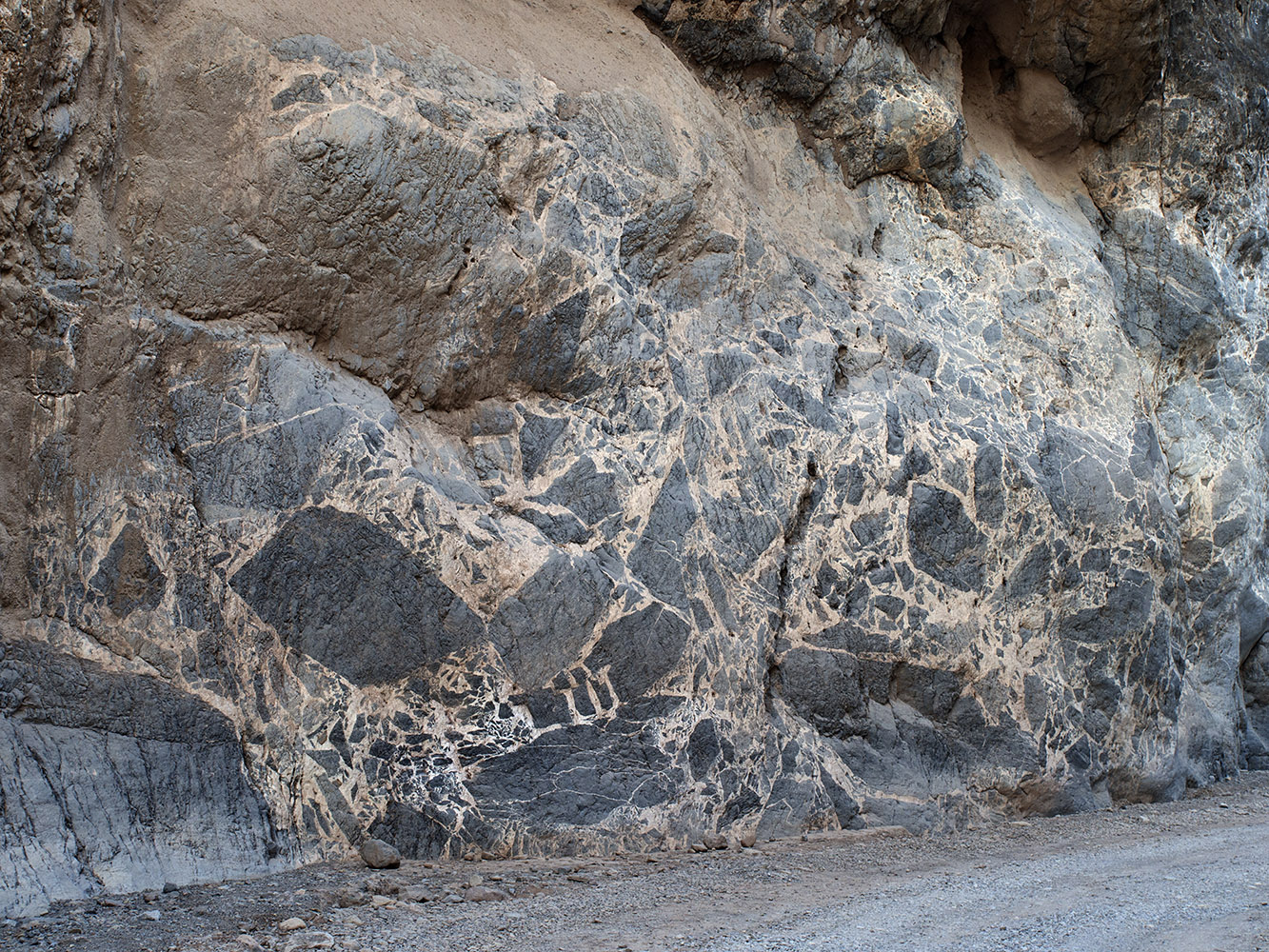 Limestone megabreccia re-cemented with crystalline calcite at bottom of Titus Canyon.