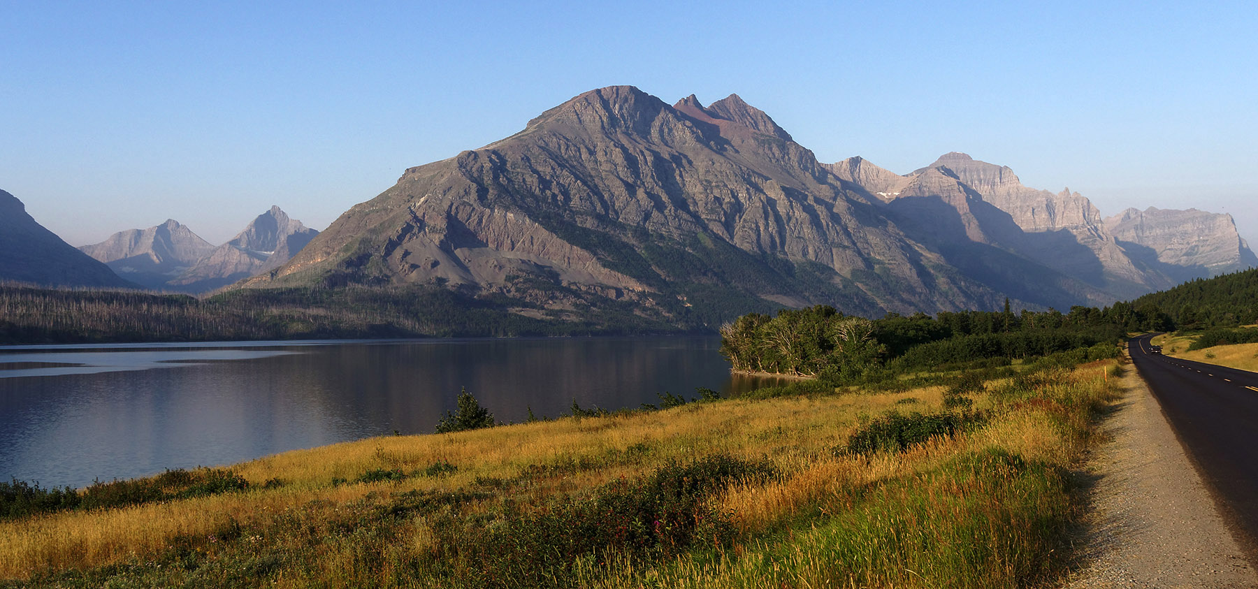 Red Eagle Mountain and Lake St. Mary at sunrise along Going-to-the-Sun Road.