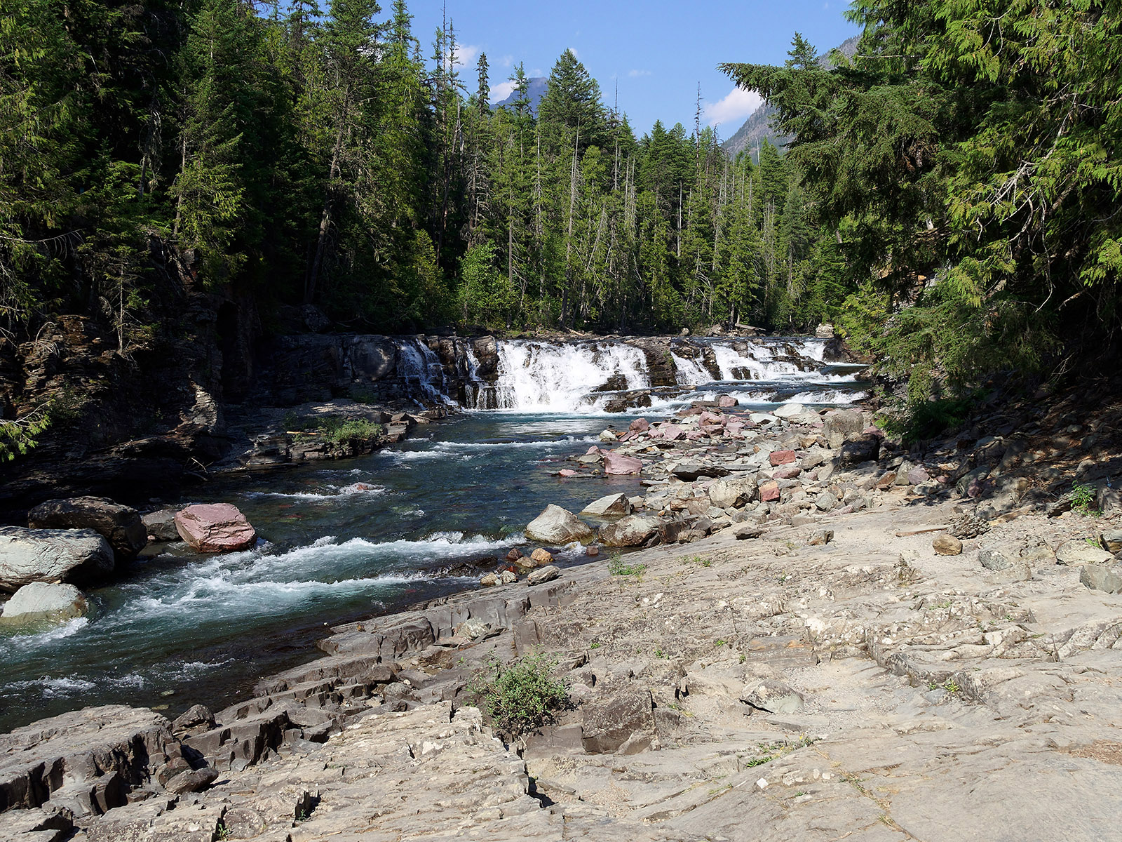 McDonald Creek passes through Prichard formation sedimentary layers.
